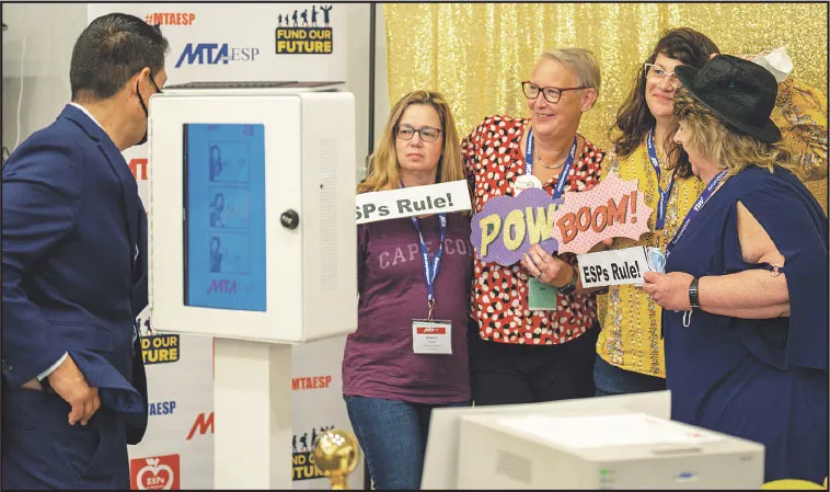 In the exhibit room at the hotel, one of the most popular tables included a photo booth with fun props. During the conference, groups of Education Support Professionals got together to pose during breaks in the sessions.