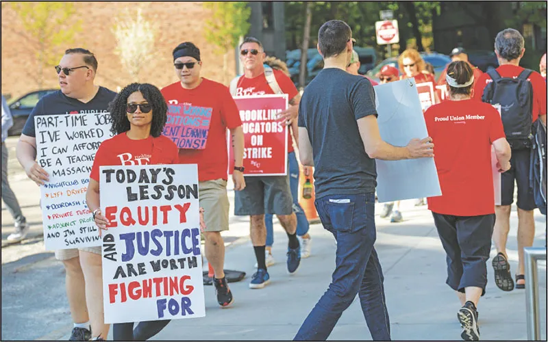 Members of the Brookline Educators Union marched near the high school during their strike in May. They also set up picket lines in front of other schools as they fought to win a fair contract.