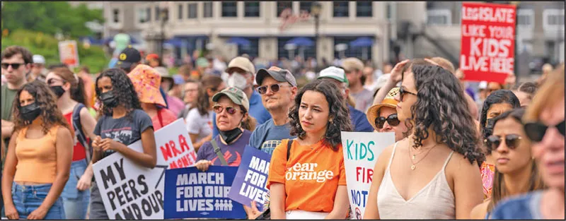 More than 1,000 people, including many educators and students, attended the rally in Boston.