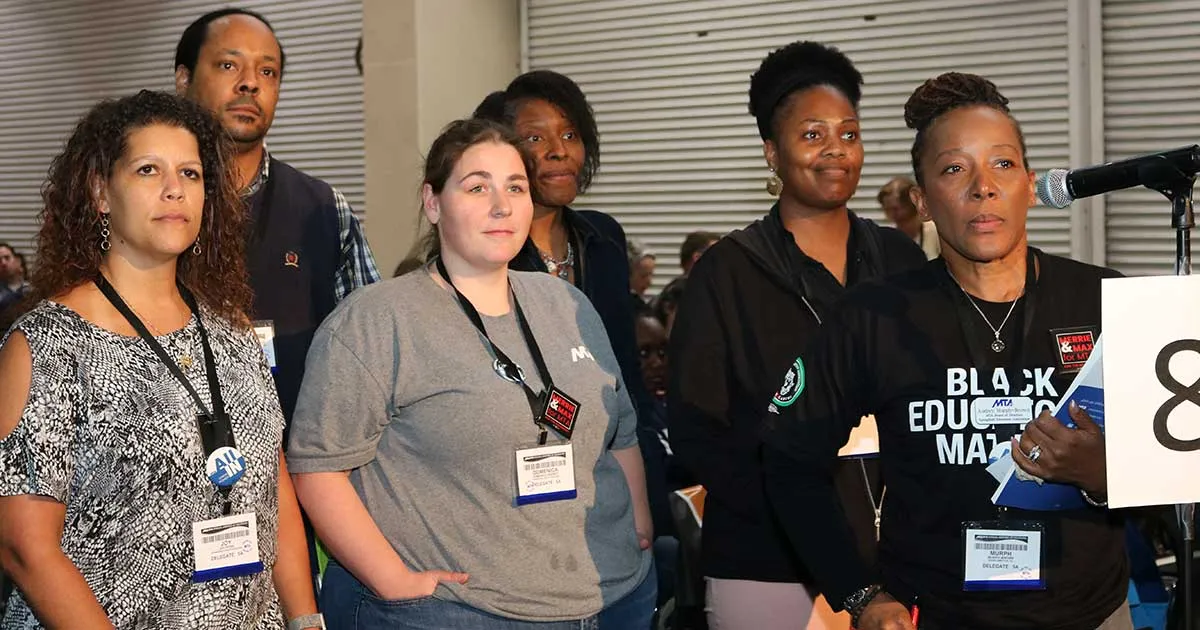 Members of the Springfield Education Association addressed the Annual Meeting on Friday.