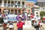 "Massachusetts is still a very wealthy place for those at the top," MTA Vice President Max Page told the crowd during a Raise Up Massachusetts rally that was held outside the State House on Labor Day.