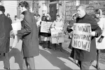 Striking teachers marched in a picket line outside Woburn High School in 1970