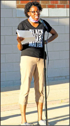  A Juneteenth rally and march for racial justice in Milton drew hundreds of educators and community allies. Many voiced their strong support for teacher Zakia Jarrett, above. 