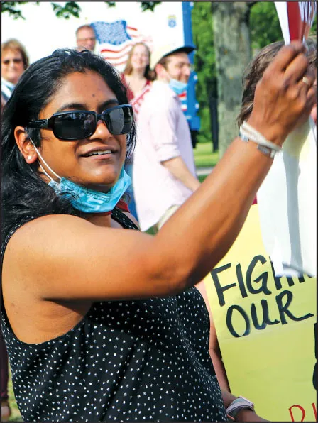 Celeste Cruise, top, and Kristina Woods showed their support.