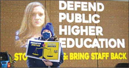 MTA members teamed up with projectionists from The Illuminator, an arts-activist group, to display messages on campus and municipal buildings.