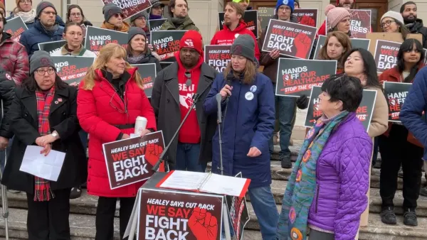 People gathered at a rally in Arlington, Massachusetts, advocating for the protection of health care.
